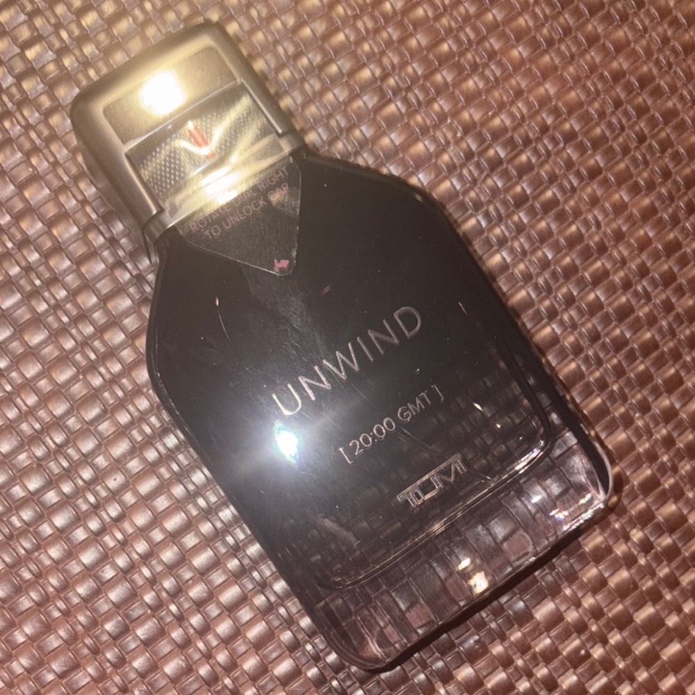 Tumi Unwind Black Bottle Brand New